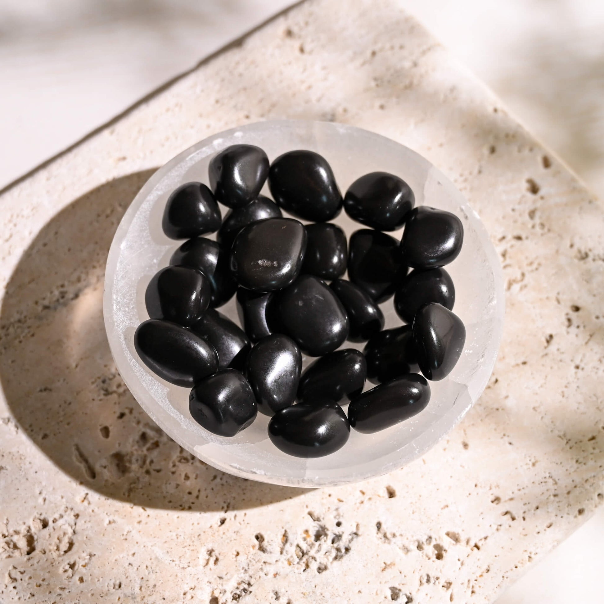 Black Agate Tumbled Stone in Selenite bowl