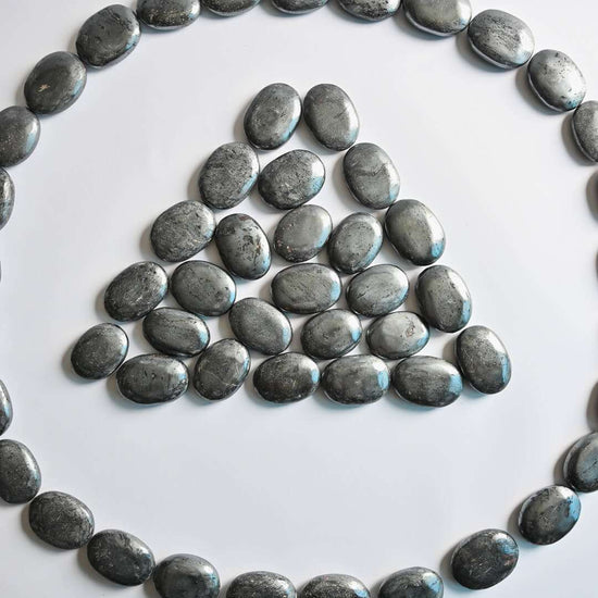 Pattern made by Hematite Palm Stones