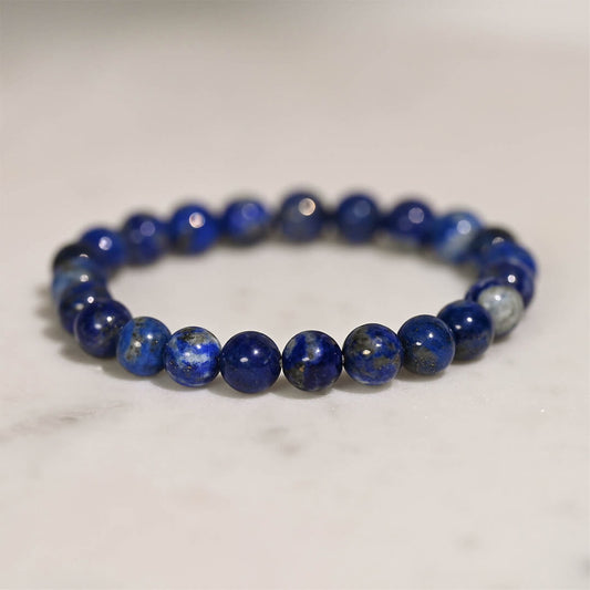 Lapis Lazulli Crystal Bracelet on white surface by Maison Etherique