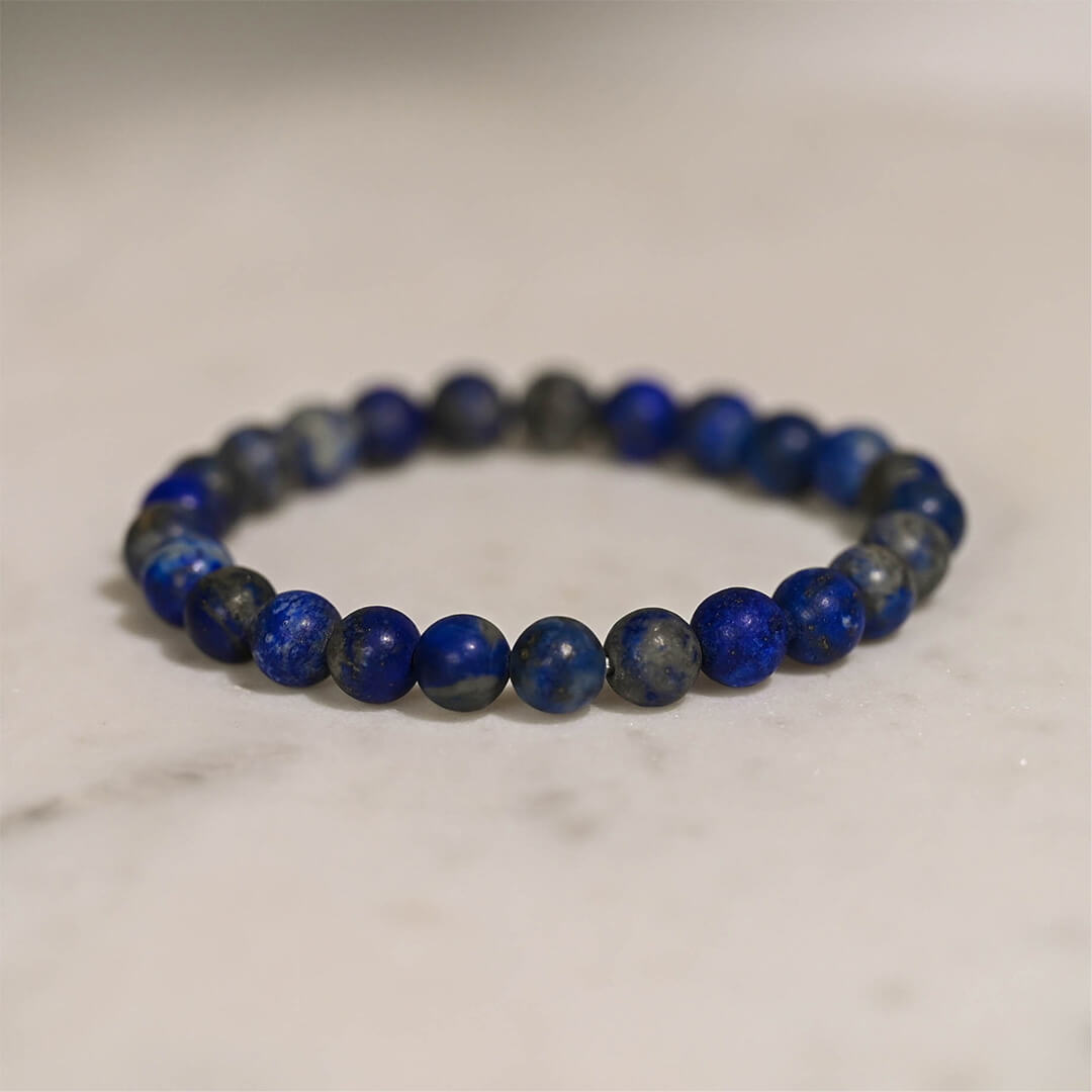 Lapis Lazuli Crystal Bracelet on table 