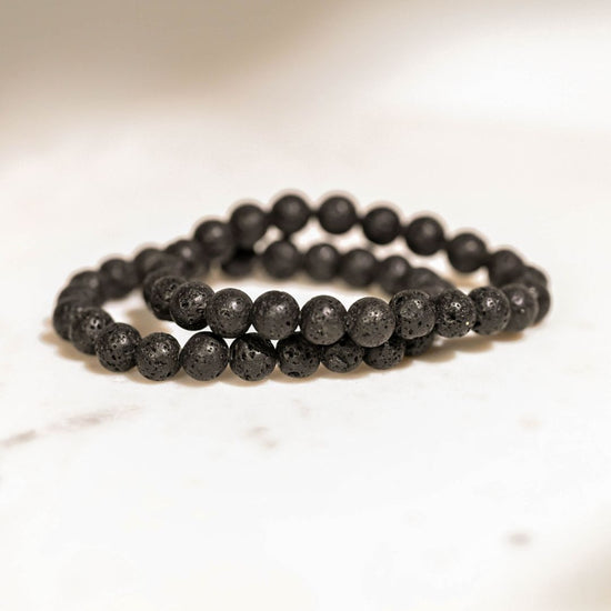 Lava Stone Bracelets on table