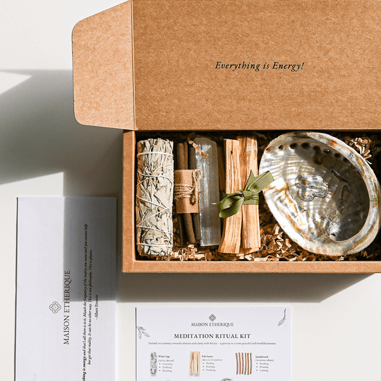 An opened box of Meditation Ritual Kit on table 