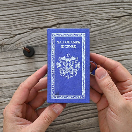 hands holding Nag Champa Incense Box