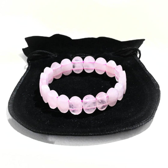 Rose Quartz Faceted Bracelet Placed on black velvet pouch