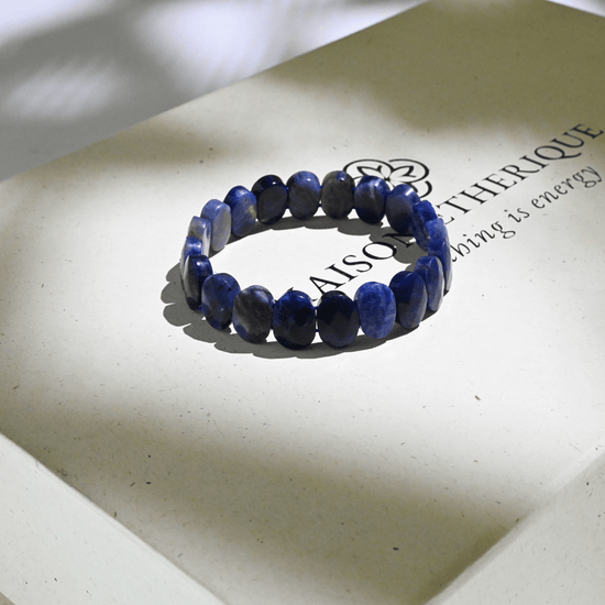 Sodalite bracelet placed on top of Maison Etherique box