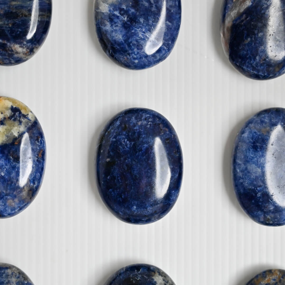 Sodalite Palm Stone in white surface