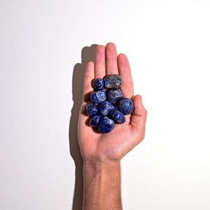 Sodalite Tumbled Stones in hand 