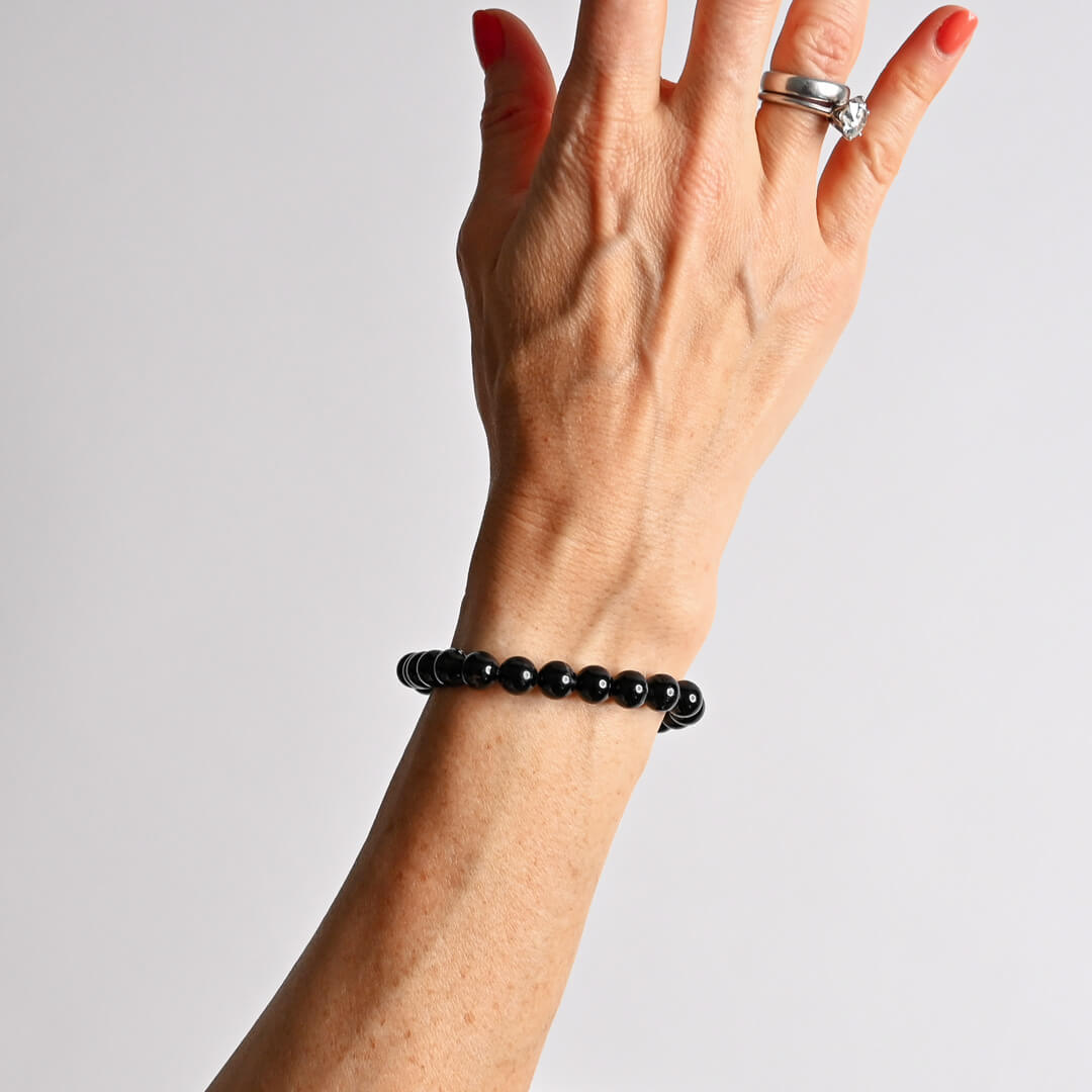 Black Tourmaline Bracelet in lady's hand